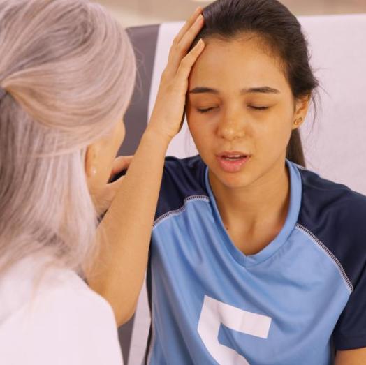 An Athletic Trainer�??s Role in Helping Prevent, Assess and Care for a Concussed Athlete