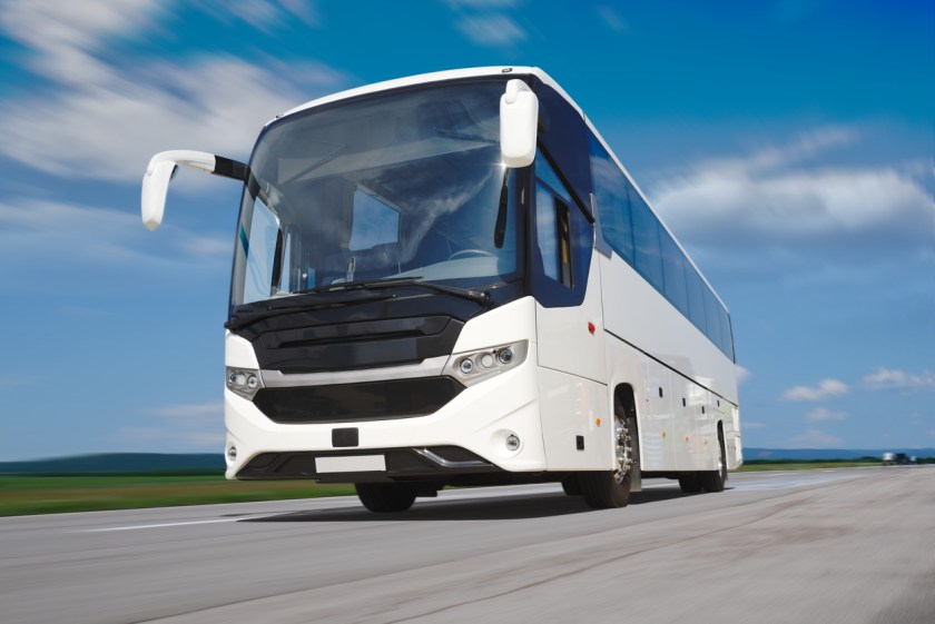 White Tour Bus on the Road